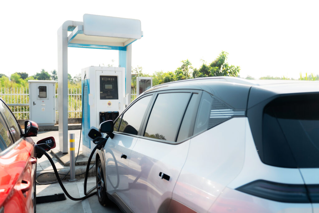 An EV charging at a public station